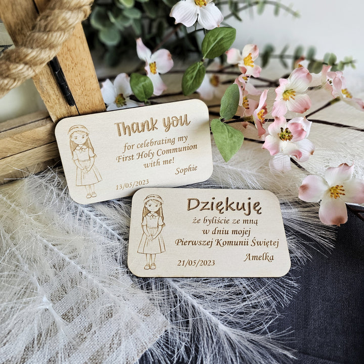 a couple of wooden tags sitting on top of a table