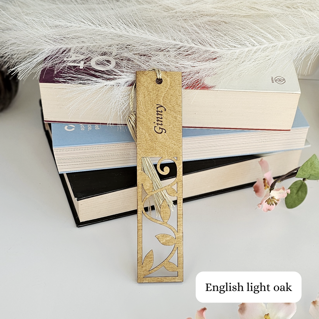 a close up of a bookmark on a pile of books