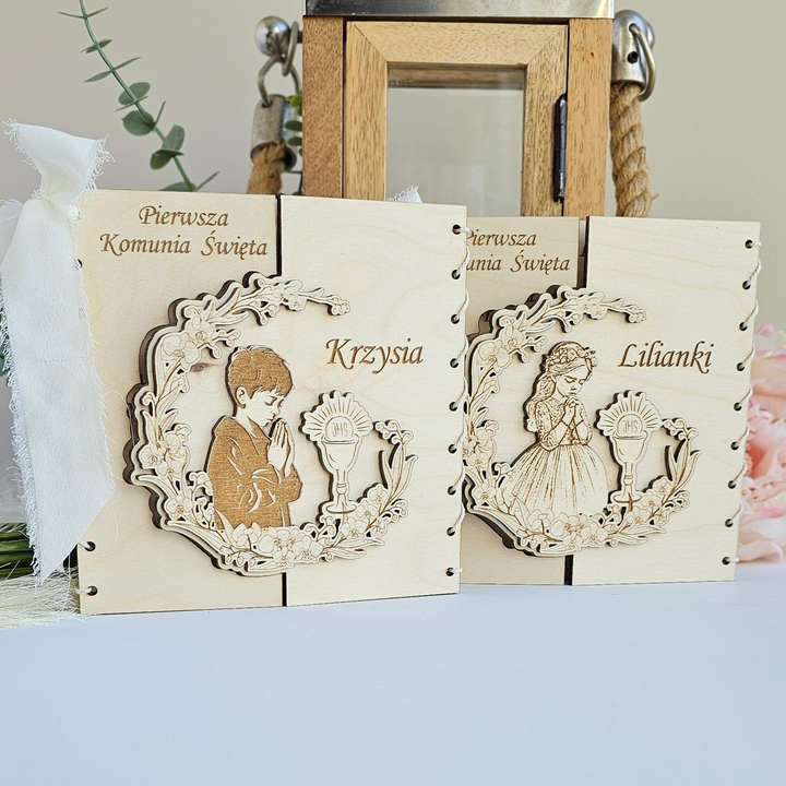 two wooden greeting cards with engraved illustrations of a boy and a girl, along with the names "Krzysia" and "Lilanki" on them.