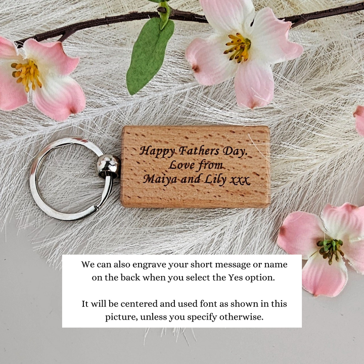 a cork keychain with a message on it