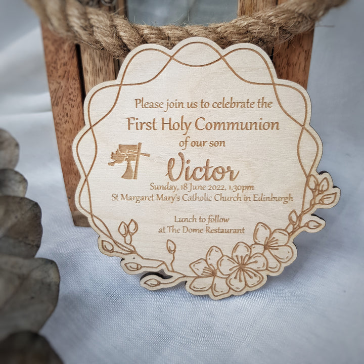 The image is a wooden invitation card for a First Holy Communion of a son named Victor, which is scheduled for Sunday, June 18, 2002, at 3:30 pm at St Margaret's Catholic Church in Edinburgh.