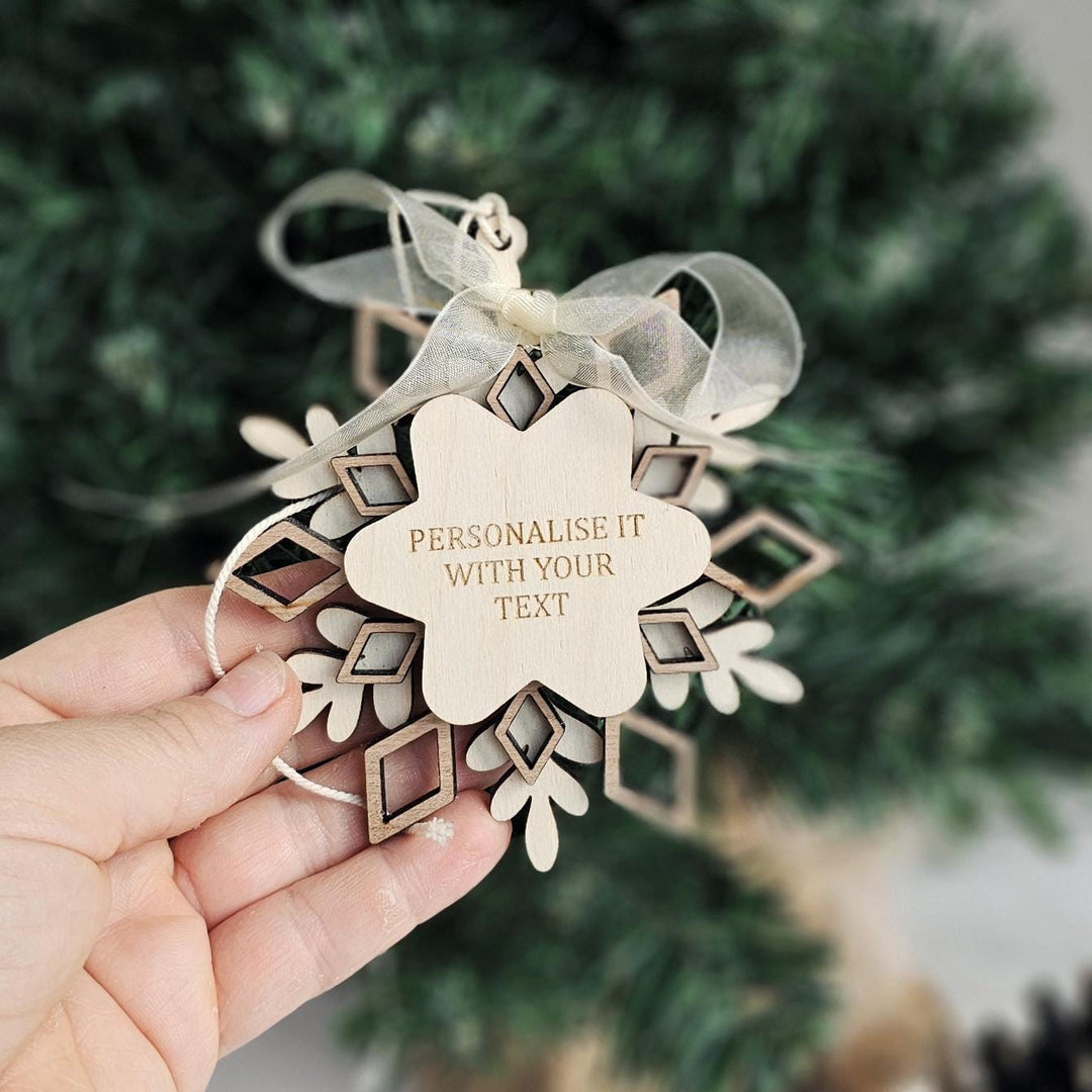 Layered wooden snowflake ornament with fully customisable engraved text
