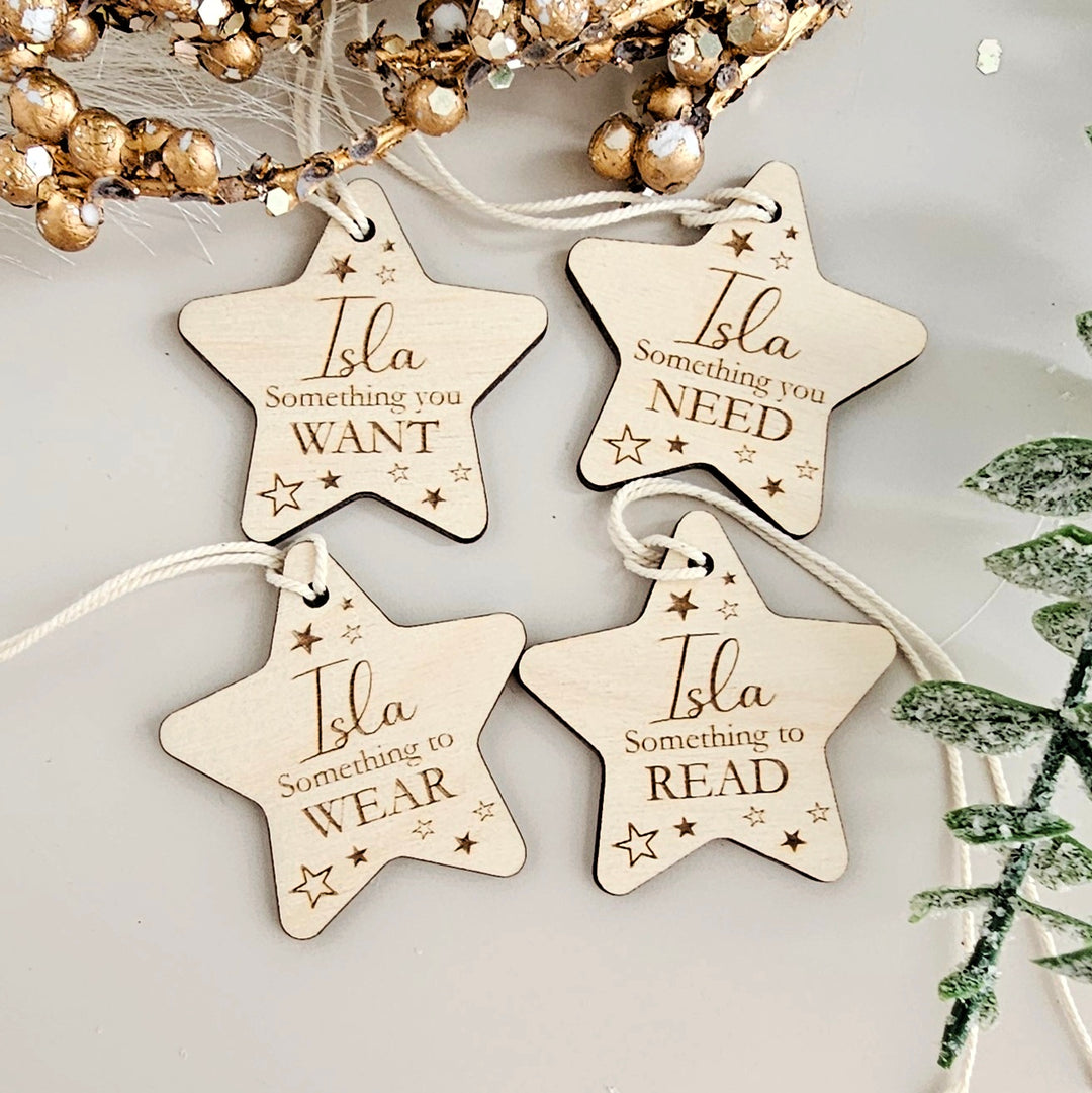 three wooden star ornaments hanging from a string