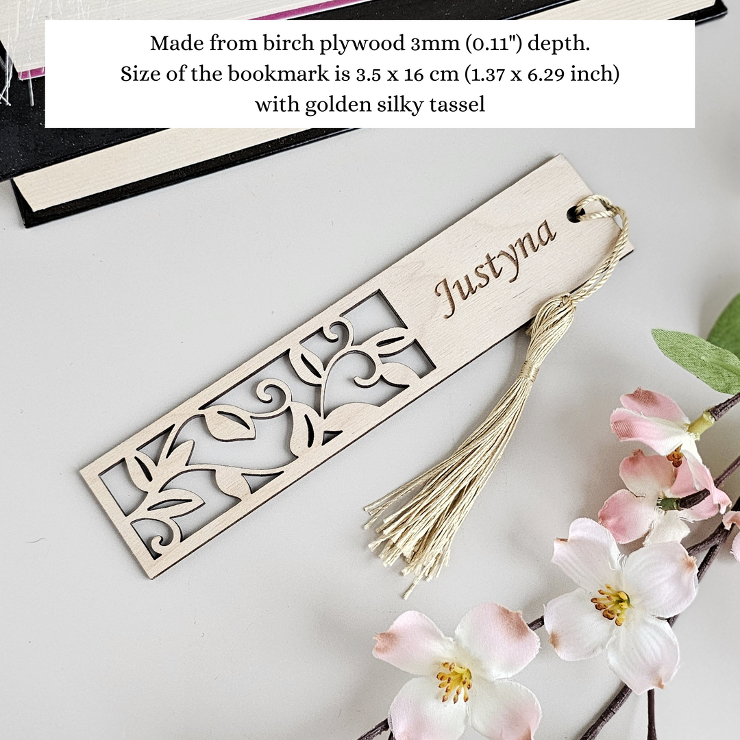 a bookmark with a tassel on top of it