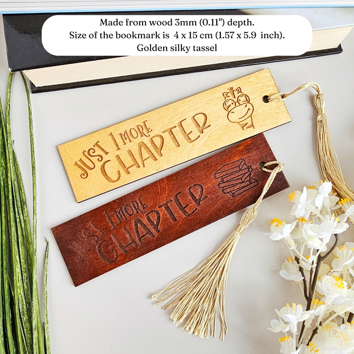 a couple of wooden signs sitting on top of a table