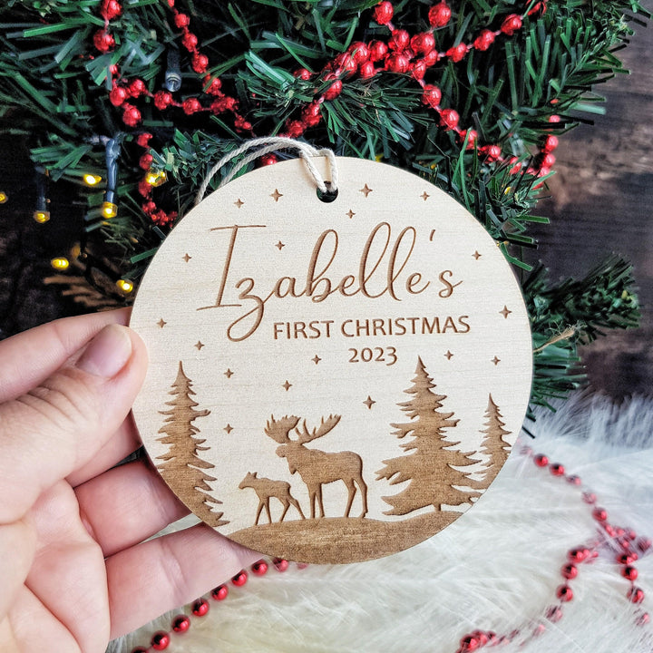 Personalised Round Wooden Ornament - Babys First Christmas Bauble with Winter Moose Christmas Forest Design