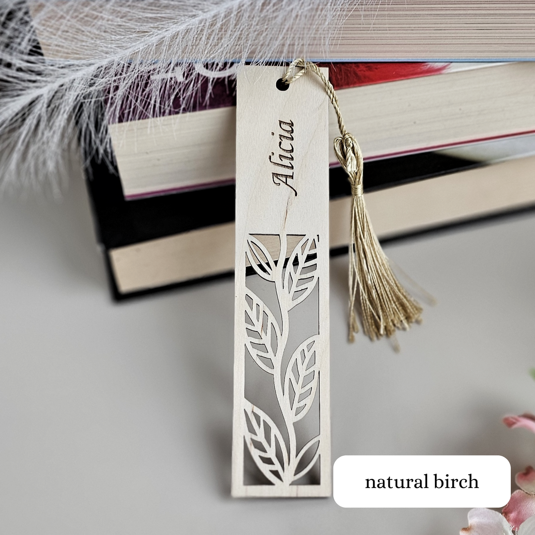 a bookmark with a tassel hanging from it