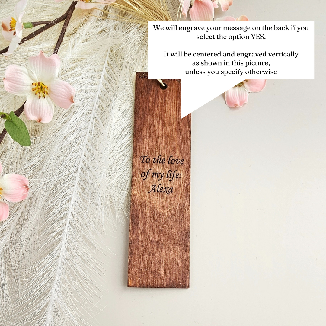 a wooden bookmark with a quote on it