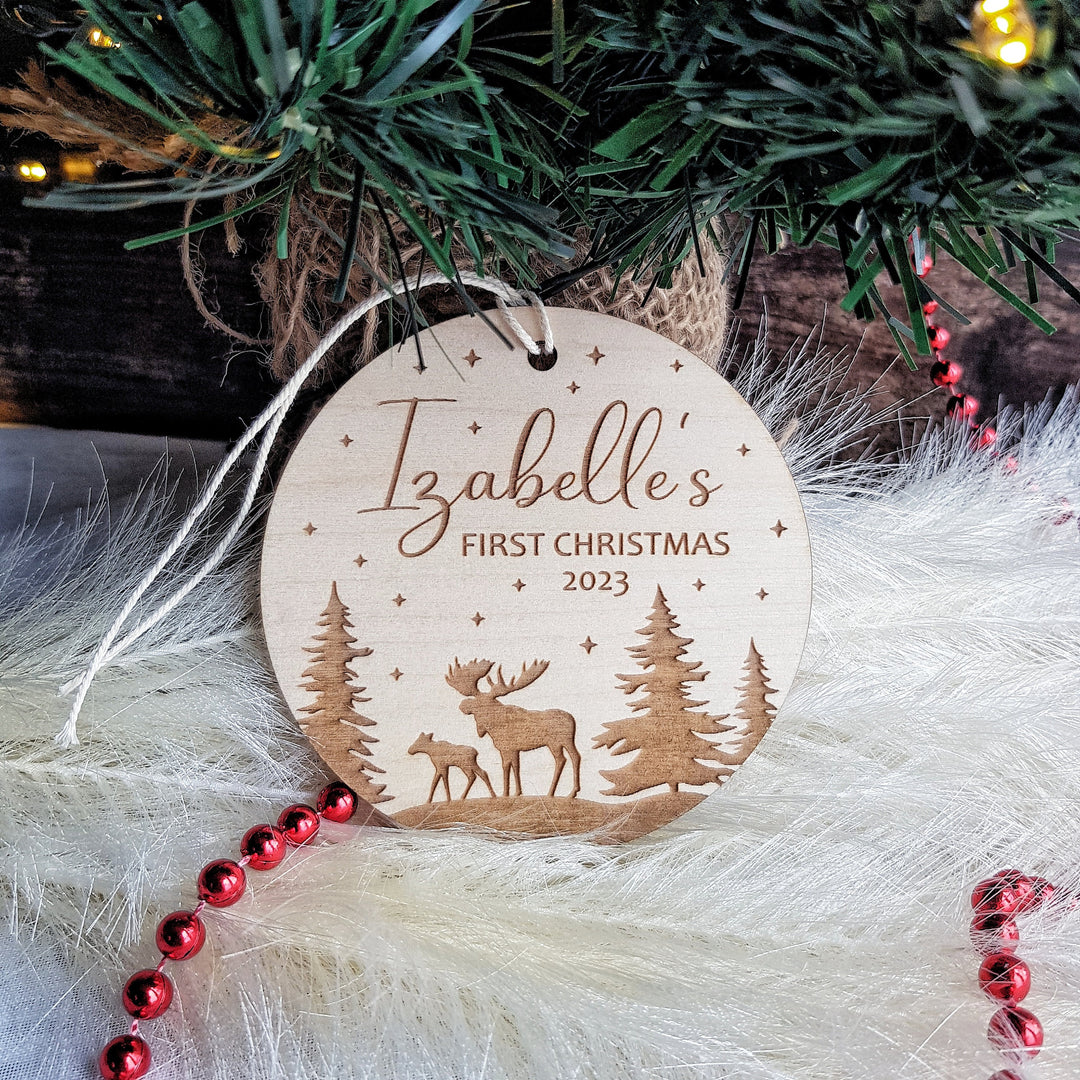 Personalised Baby's First Christmas Tree Bauble - Round Wooden Ornament with Christmas Forest and Winter Moose design