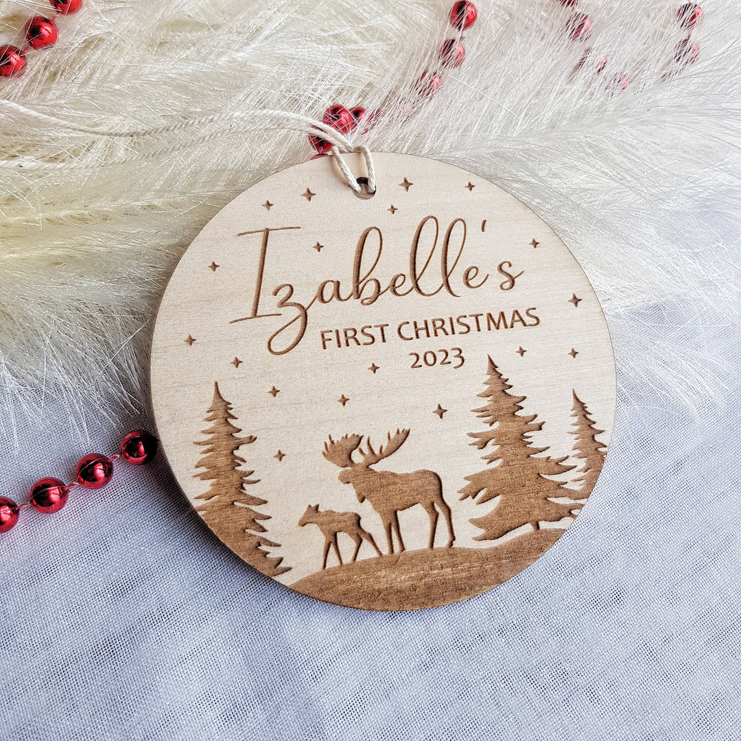 Personalised Baby's First Christmas Tree Bauble - Round Wooden Ornament with Christmas Forest and Winter Moose design