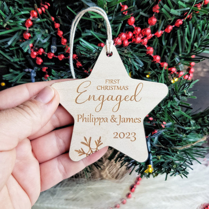 First Christmas Engaged Star Bauble - Personalised Wooden Keepsake, Rustic Tree Ornament, Festive Decoration