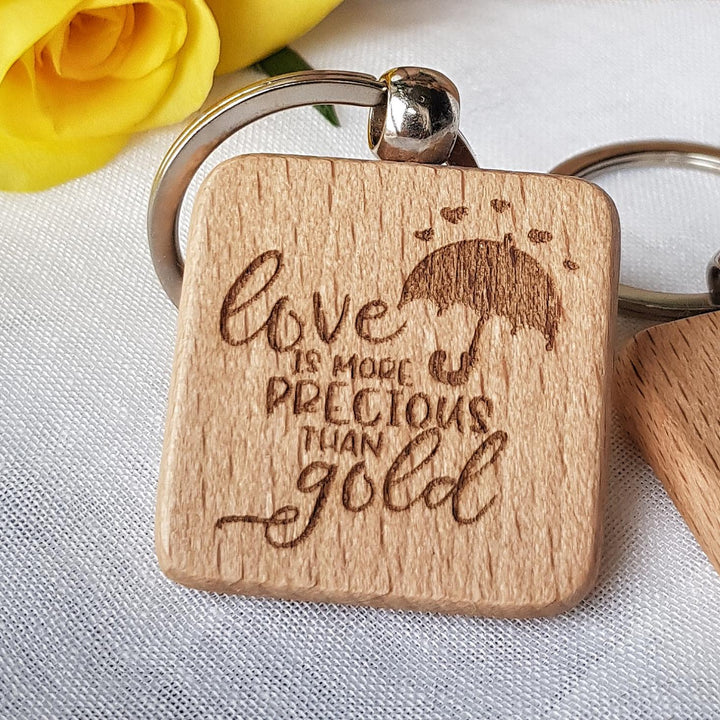 Wooden Keyring Love is more precious than gold